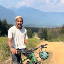 Rajiv on a mountain bike trail